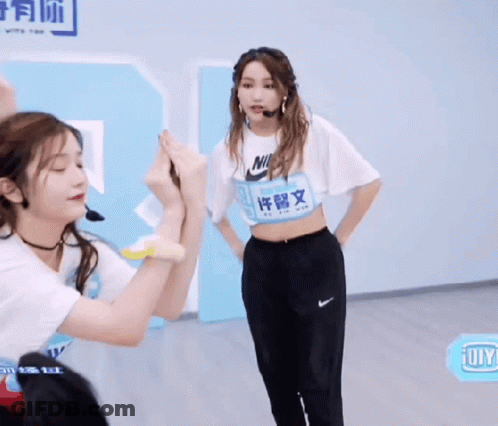 Girl Wearing Nike Shirt With Chinese Writing GIF