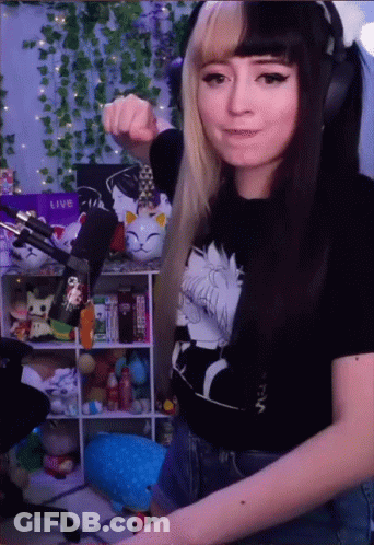 Girl Wearing SFW Shirt And Headphones At Microphone GIF