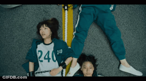 Girl Wearing Shirt Saying 240 Laying On Floor GIF