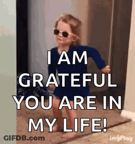 Girl Wearing Sunglasses In Hallway GIF