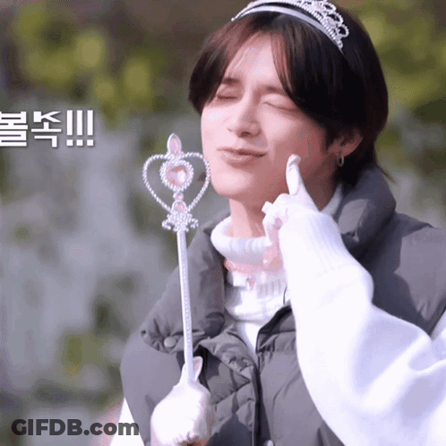 Girl Wearing Tiara And Holding Wand GIF