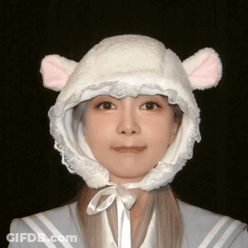 Girl Wearing White Hat With Pink Ears GIF