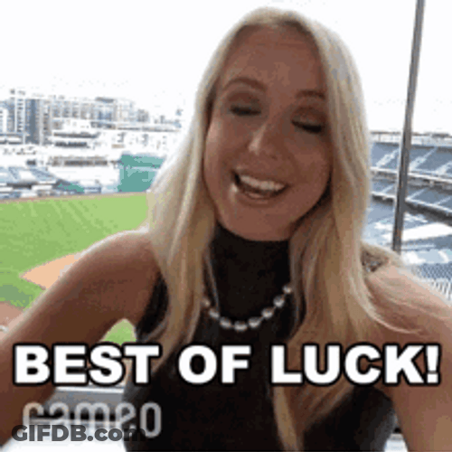 Girl Wishing Best Of Luck With Fist GIF