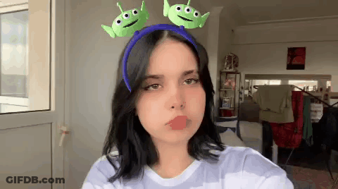 Girl With Alien Headband GIF
