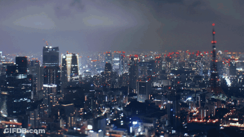 Girl With Angel Wings In Front Of City GIF