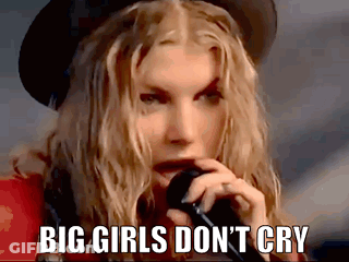 Girl With Arm Cast At Desk Saying I'm Not Raising My Hand GIF