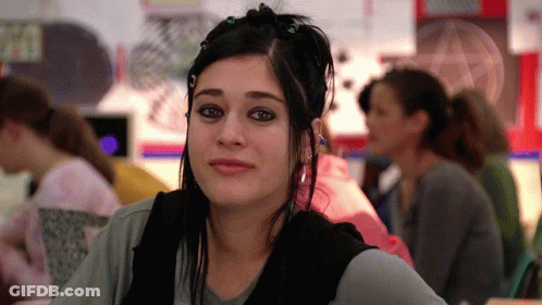 Girl With Black Hair Sitting In Classroom GIF