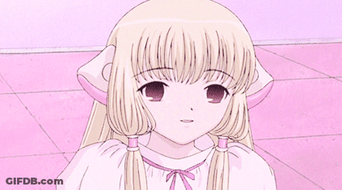 Girl With Blonde Hair And Pigtails Sitting GIF