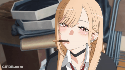 Girl With Blonde Hair And Red Eyes Eating Chocolate Bar GIF