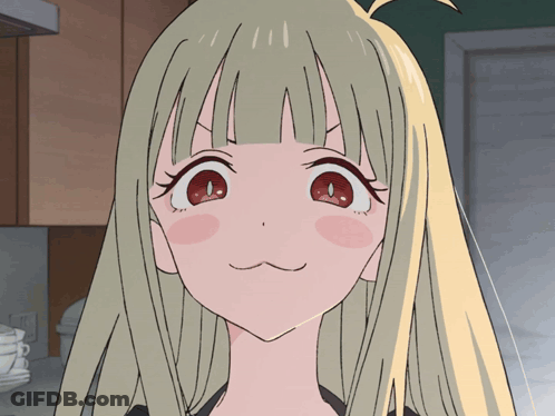 Girl With Blonde Hair And Red Eyes Making Face GIF