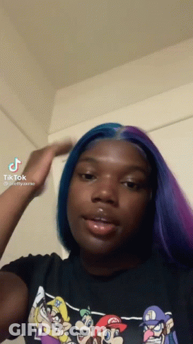 Girl With Blue And Purple Hair In Mario Shirt GIF