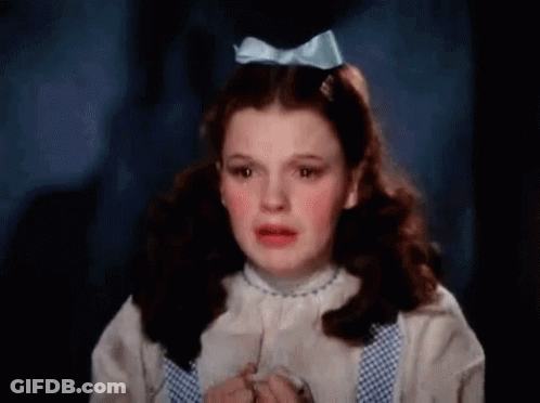 Girl With Blue Bow Crying GIF