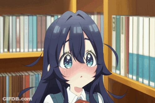 Girl With Blue Eyes Standing In Front Of Bookshelf With Book Titled A GIF
