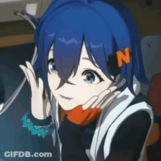Girl With Blue Hair And N Sitting At Computer GIF