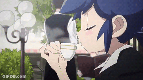 Girl With Blue Hair Drinking Tea And Reading Book GIF