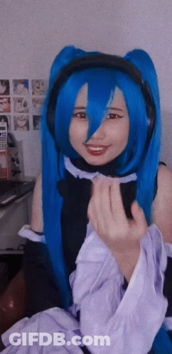 Girl With Blue Hair In Headphones And Maid Outfit GIF
