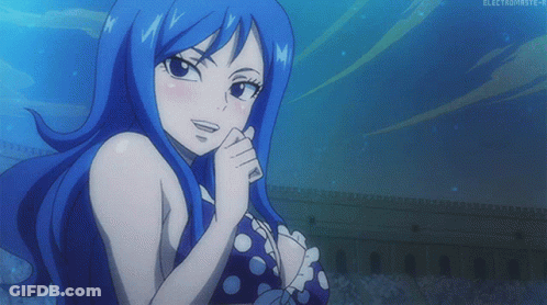 Girl With Blue Hair In Polka Dot Bikini Smiling GIF
