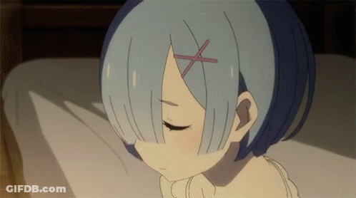 Girl With Blue Hair Laying On Bed GIF