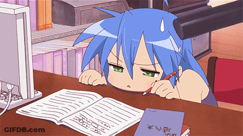 Girl With Blue Hair Sitting At Desk With Book GIF