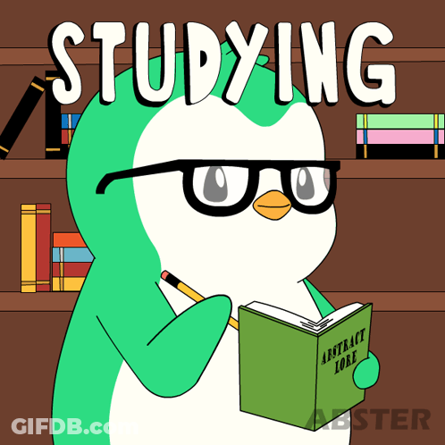 Girl With Blue Hair Sitting At Desk With Book GIF