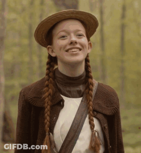 Girl With Braids In Straw Hat And Brown Jacket GIF