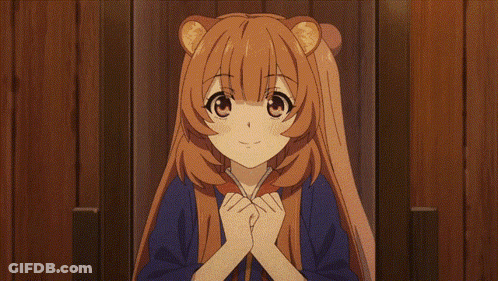 Girl With Brown Hair And Bear Ears Smiling Hands Folded GIF
