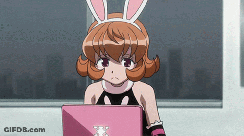 Girl With Bunny Ears Looking At Laptop GIF