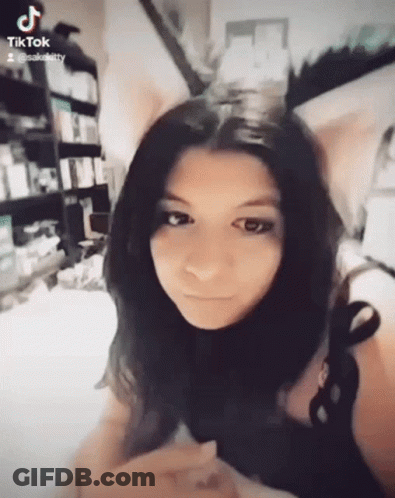 Girl With Cat Ear Headband And TikTok Icon GIF