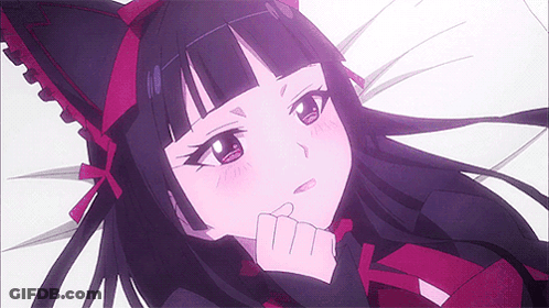 Girl With Cat Ear Headband Laying Down Hand On Chin GIF