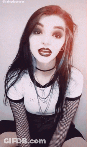 Girl With Choker And Fishnet Sleeves Hashtag RainyDayRoses GIF