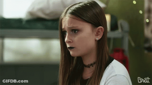 Girl With Choker Saying Brat GIF