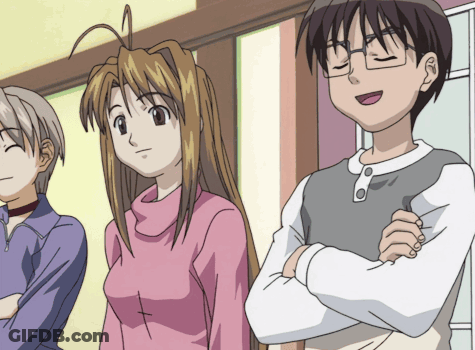 Girl With Cross On Chest Next To Boy With Arms Crossed GIF