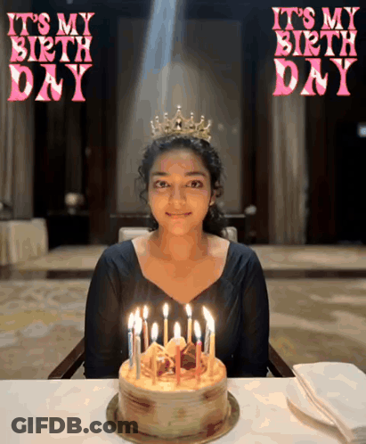 Girl With Crown Sitting In Front Of Birthday Cake GIF