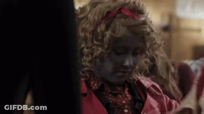 Girl With Curly Blonde Hair And Red Headband GIF