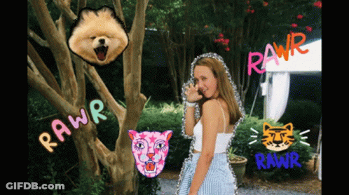Girl With Dog And Cat In Front Of Tree Saying Rawr GIF