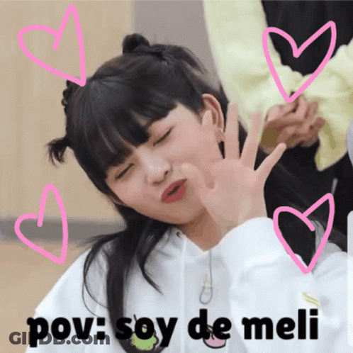 Girl With Eyes Closed Surrounded By Pink Hearts GIF