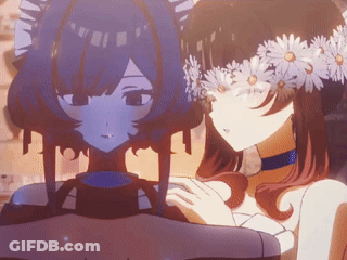 Girl With Flowers In Hair Next To Another Girl GIF