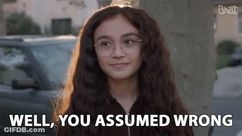 Girl With Glasses Says Well You Assumed Wrong In Front Of Car GIF