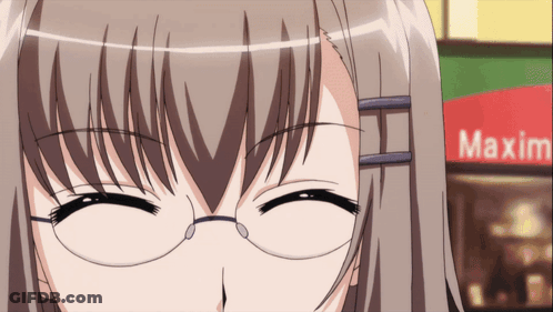 Girl With Glasses Smiling In Front Of Red Maxim Sign GIF