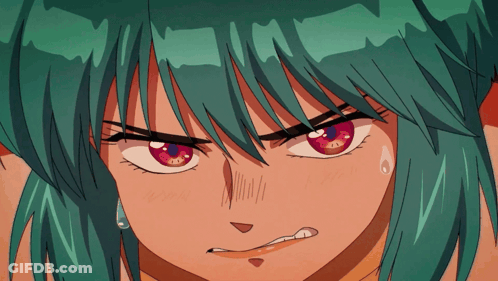 Girl With Green Hair And Red Eyes Looks Angry GIF