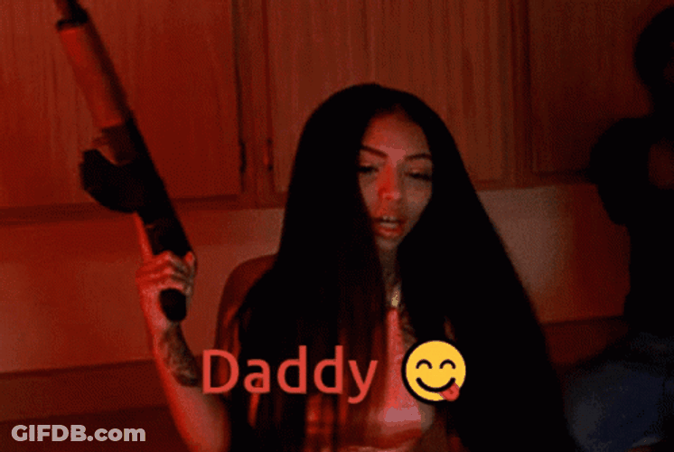 Girl With Gun Calls Daddy GIF