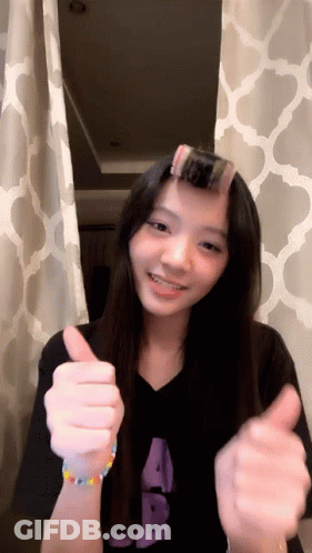 Girl With Hair Curlers Thumbs Up GIF