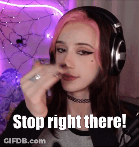 Girl With Headphones Says Stop Right There GIF