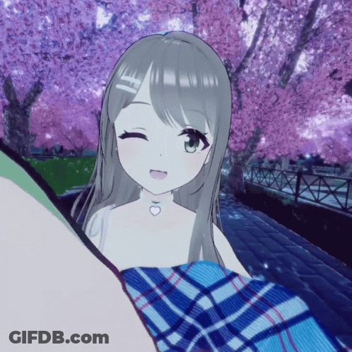Girl With Heart Necklace Winking Near Cherry Blossom Tree GIF