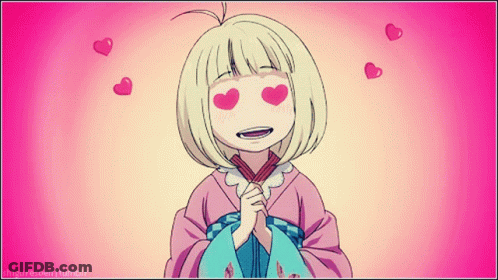 Girl With Hearts In Eyes Surrounded By Pink Hearts GIF
