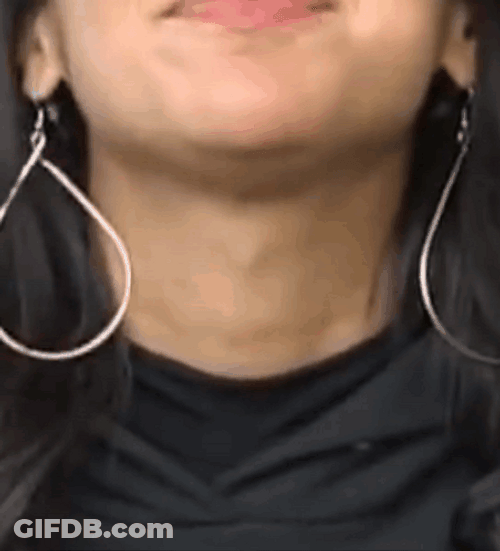 Girl With Hoop Earrings Swallow Motion GIF