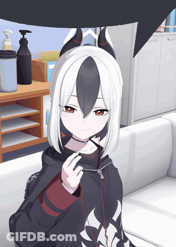 Girl With Horns Sitting On Couch GIF