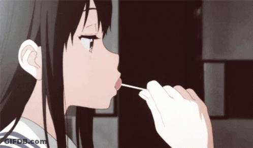 Girl With Long Black Hair Licking Stick GIF