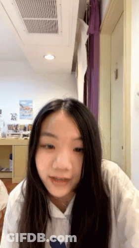 Girl With Long Black Hair Looking GIF