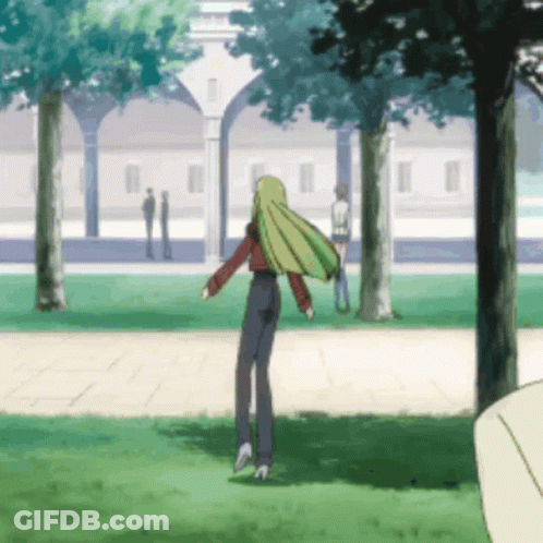 Girl With Long Green Hair Standing In Park GIF